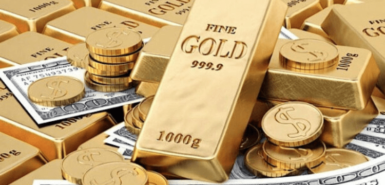 Gold reaches high after devaluation of Pakistani rupee.