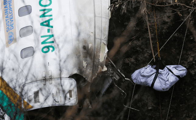 Searchers locate the aircraft's black boxes after the fatal Nepal crash