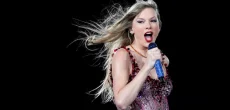 Taylor Swift experienced a humorous onstage moment during her third Eras Tour show in London on June 23. While performing "All Too Well" at Wembley Stadium, the 34-year-old singer accidentally swallowed a bug, causing her to cough mid-song. Swift quickly recovered, jokingly asking the audience, "I swallowed a bug, can you sing?" This incident mirrored a similar mishap in Chicago last December, where she also joked about swallowing a bug during a performance. Adding to the night's surprises, Swift's boyfriend, Travis Kelce, joined her onstage during the Tortured Poets Department segment to assist with a costume change. Kelce, dressed sharply in a top hat and jacket, helped Swift transition into her attire for "I Can Do It With a Broken Heart," creating a memorable moment for fans. The London shows also featured special guest appearances, including singer Gracie Abrams, who performed her collaboration with Swift, "Us," during the surprise songs segment. Notably, the audience included Prince William and his children—Prince George, Princess Charlotte, and Prince Louis—on Friday, marking Prince William's 42nd birthday celebration at Swift's concert. Travis Kelce's presence alongside his brother Jason and sister-in-law Kylie added a familial touch to the occasion, with the Kelce family enjoying the fan support and camaraderie among Swift's admirers. Swift's European leg of the Eras Tour has been a success following her shows in Paris and Cardiff, continuing to draw enthusiastic crowds across the continent.