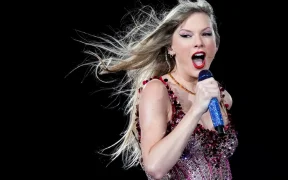 Taylor Swift experienced a humorous onstage moment during her third Eras Tour show in London on June 23. While performing "All Too Well" at Wembley Stadium, the 34-year-old singer accidentally swallowed a bug, causing her to cough mid-song. Swift quickly recovered, jokingly asking the audience, "I swallowed a bug, can you sing?" This incident mirrored a similar mishap in Chicago last December, where she also joked about swallowing a bug during a performance. Adding to the night's surprises, Swift's boyfriend, Travis Kelce, joined her onstage during the Tortured Poets Department segment to assist with a costume change. Kelce, dressed sharply in a top hat and jacket, helped Swift transition into her attire for "I Can Do It With a Broken Heart," creating a memorable moment for fans. The London shows also featured special guest appearances, including singer Gracie Abrams, who performed her collaboration with Swift, "Us," during the surprise songs segment. Notably, the audience included Prince William and his children—Prince George, Princess Charlotte, and Prince Louis—on Friday, marking Prince William's 42nd birthday celebration at Swift's concert. Travis Kelce's presence alongside his brother Jason and sister-in-law Kylie added a familial touch to the occasion, with the Kelce family enjoying the fan support and camaraderie among Swift's admirers. Swift's European leg of the Eras Tour has been a success following her shows in Paris and Cardiff, continuing to draw enthusiastic crowds across the continent.