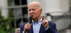 Biden asserts, "I'm not going anywhere," as calls for him to quit the race grow