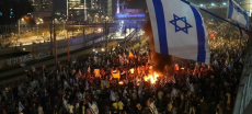 Thousands in Israel Protest Dismissal of Defence Minister