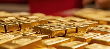 Gold dips as dollar strengthens, trade deal hopes rise
