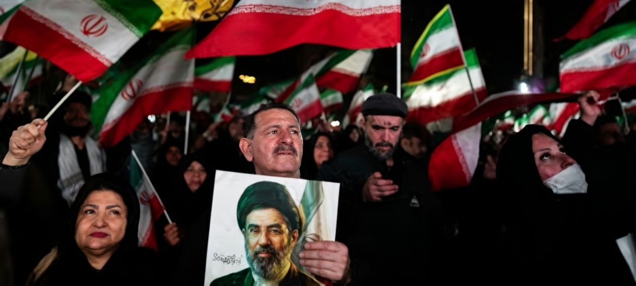 Iranian Women Wave Pakistani Flag in Tehran Rally Amid US Conflict